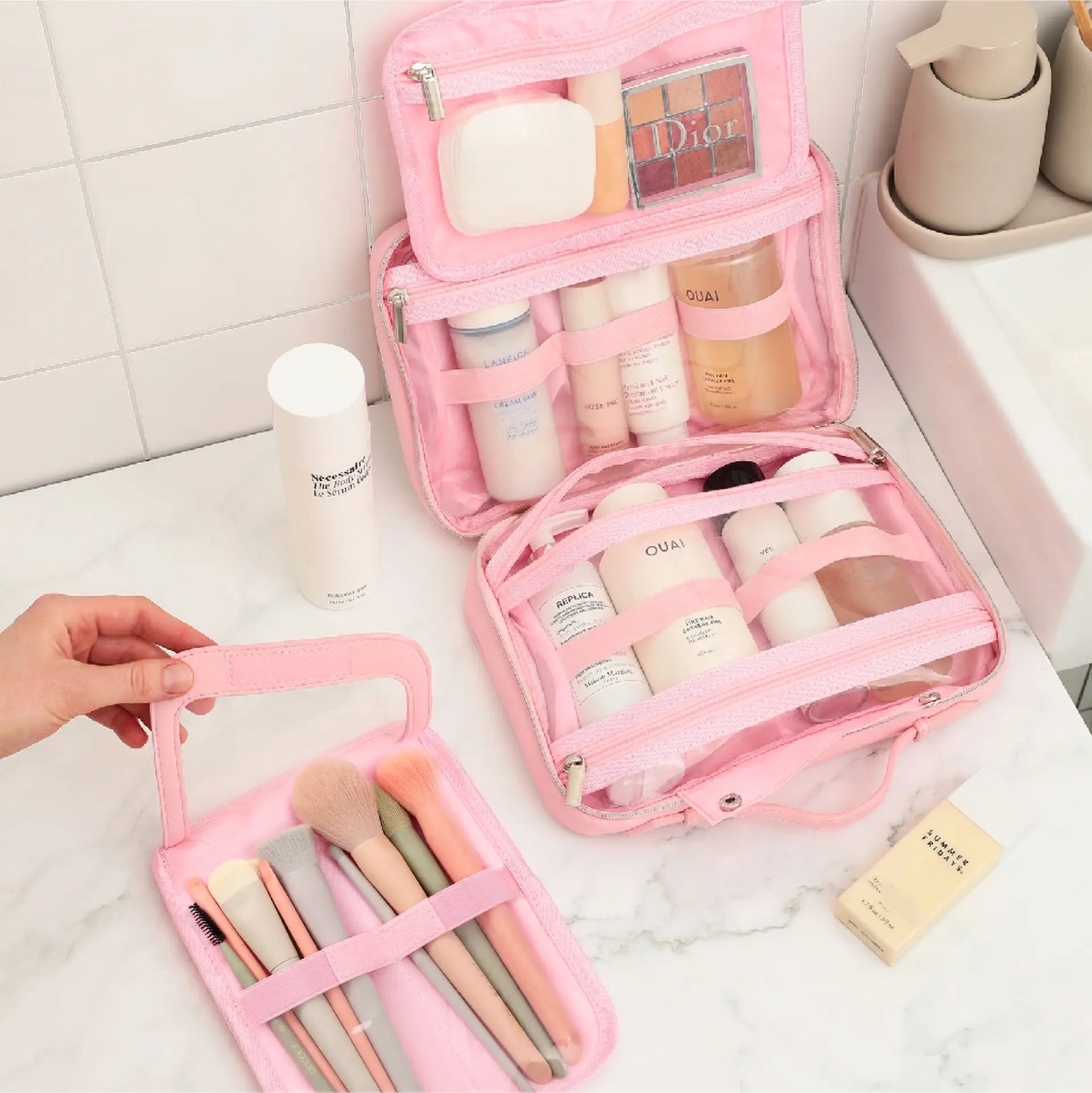 Hanging toiletry bag with removable makeup brush compartment